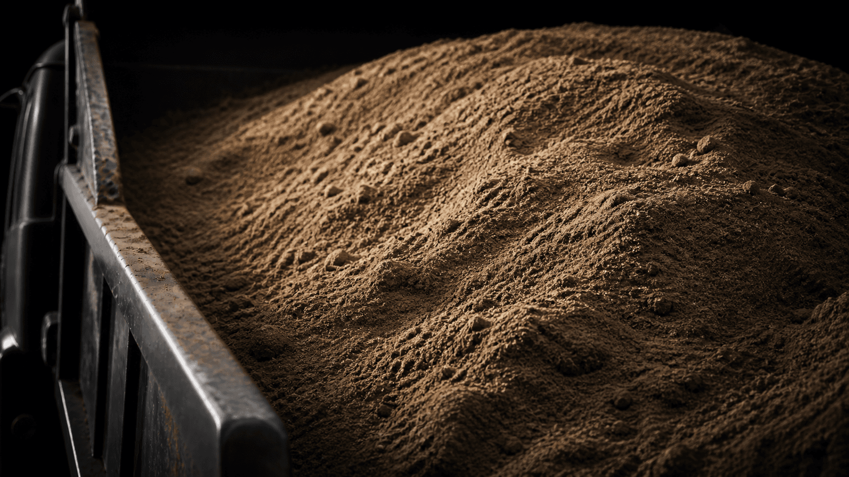 Sand loaded in a dump truck bed